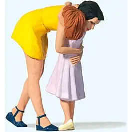 Woman Hugging Girl